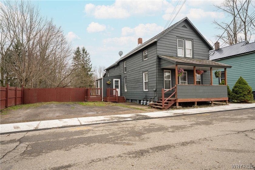 Welcome to this well maintained triplex, nestled on a quiet - Beach Home for sale in Angola, New York on Beachhouse.com