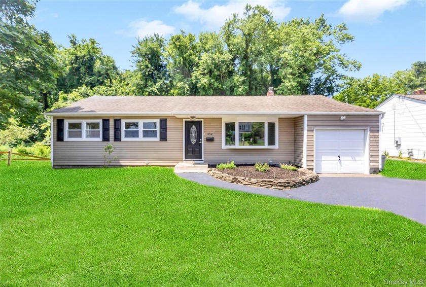 Welcome to this beautifully renovated 3-bedroom, 2-bath ranch - Beach Home for sale in Patchogue, New York on Beachhouse.com