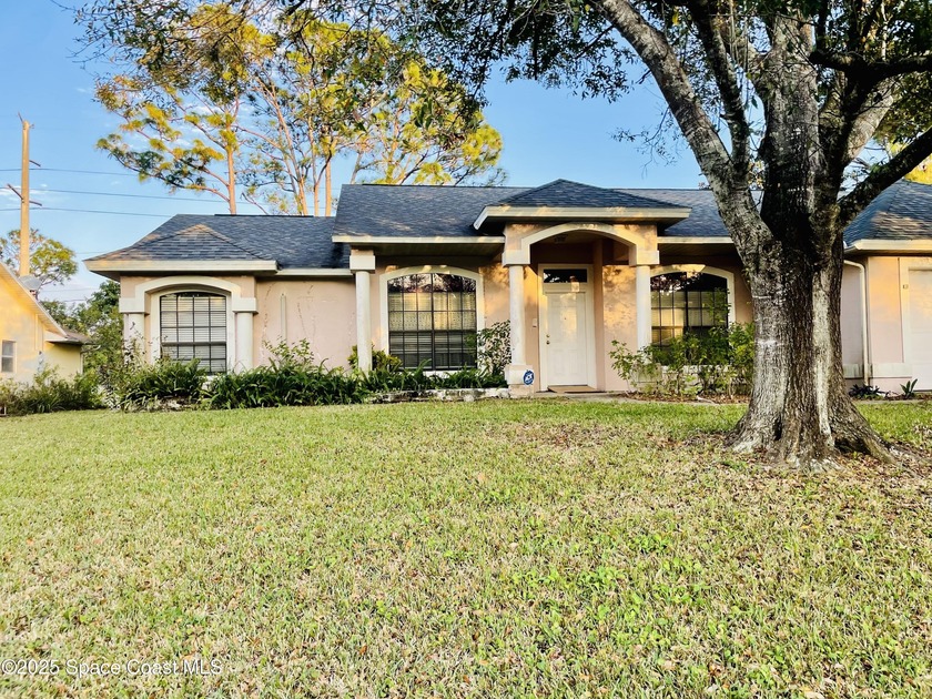 Nestled on a generous .33-acre lot, this 3 bedroom, 2 bath home - Beach Home for sale in Palm Bay, Florida on Beachhouse.com