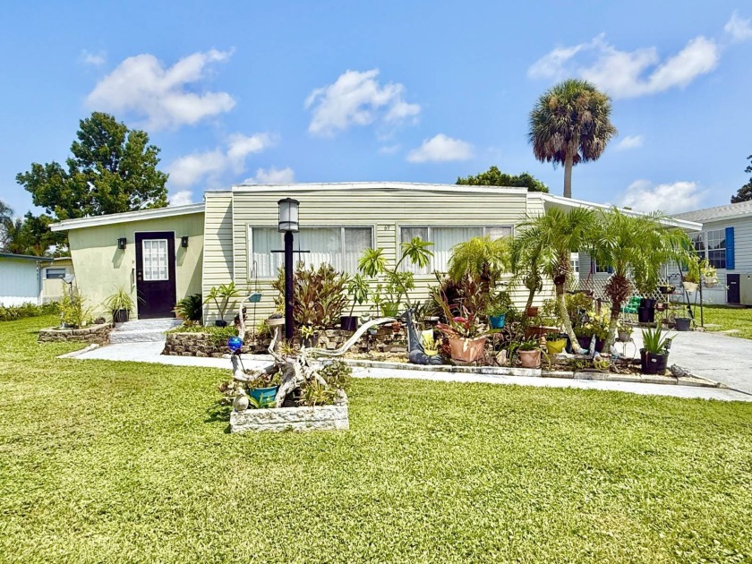Welcome to this charming home located in 55-plus community of - Beach Home for sale in Port Orange, Florida on Beachhouse.com