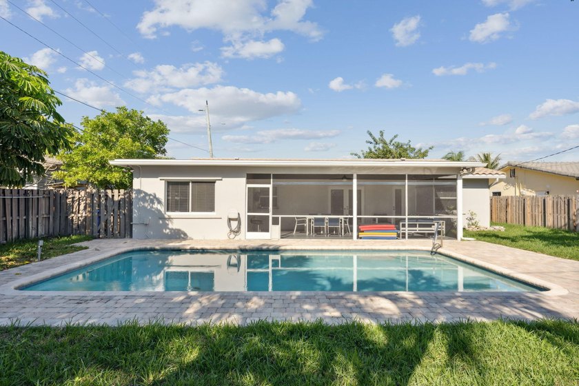 Welcome to this charming single-family home in the heart of - Beach Home for sale in Deerfield Beach, Florida on Beachhouse.com