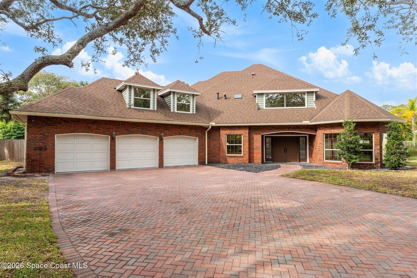 Just 3 blocks from the ocean, this gorgeous brick home rests on - Beach Home for sale in Indialantic, Florida on Beachhouse.com
