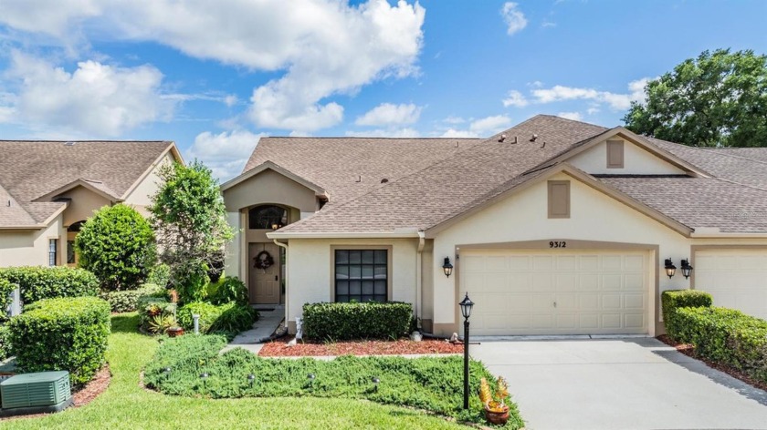 BEAUTIFUL 2 BEDROOM VILLA WITH SCREENED-IN LANAI AND FANTASTIC - Beach Home for sale in New Port Richey, Florida on Beachhouse.com