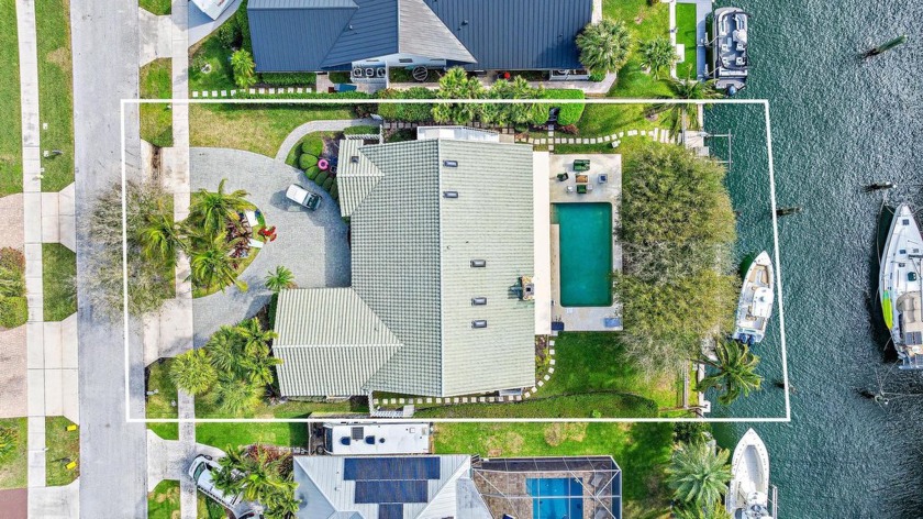 Highly sought after waterfront living awaits with NO FIXED - Beach Home for sale in North Palm Beach, Florida on Beachhouse.com