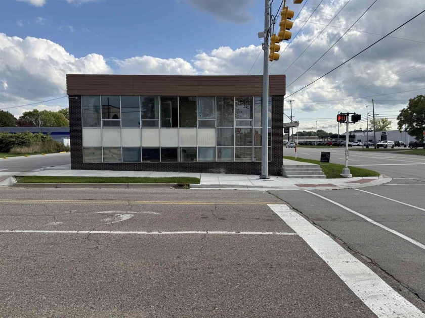 Prime commercial property featuring an improved 201 - Beach Commercial for sale in Bay City, Michigan on Beachhouse.com