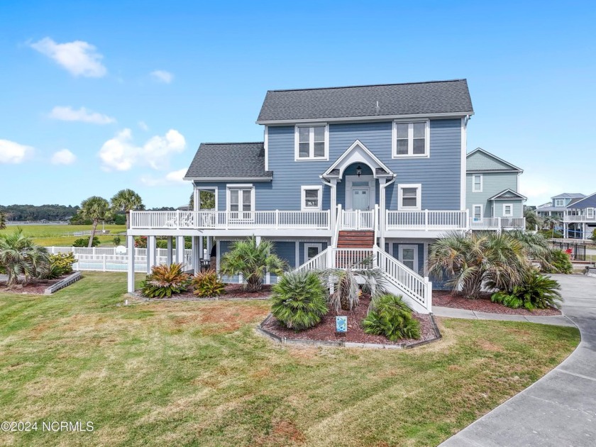 INDULGE IN THE PINNACLE OF COASTAL MARSHFRONT LIVING ON HOLDEN - Beach Home for sale in Holden Beach, North Carolina on Beachhouse.com