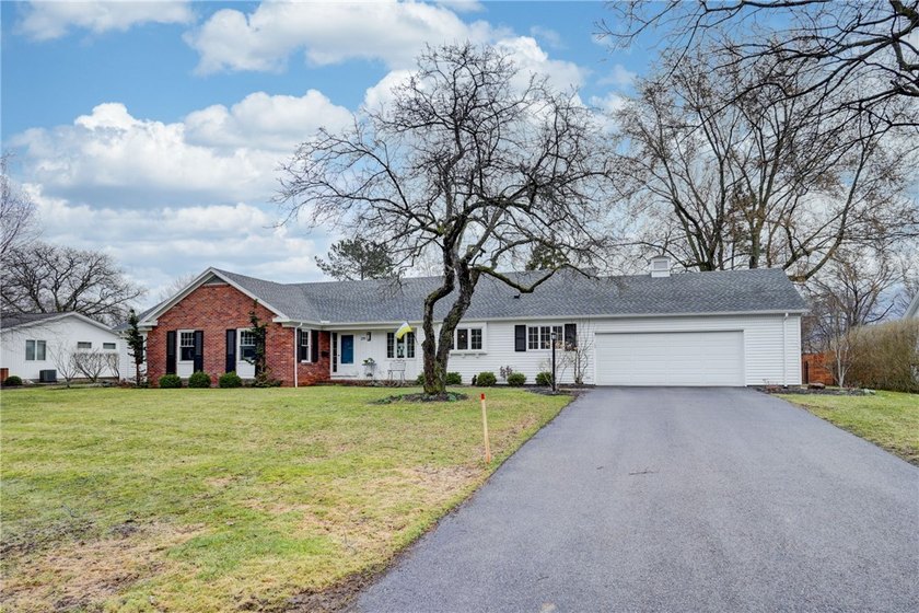 This beautifully updated 4-bedroom, 3.5-bath ranch sits on - Beach Home for sale in Rochester, New York on Beachhouse.com