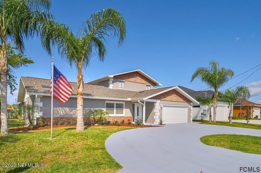 Ready to make 386 your home? This remodeled 5 bedroom, 3 bath - Beach Home for sale in Palm Coast, Florida on Beachhouse.com
