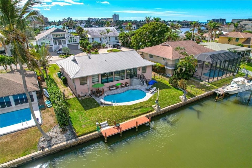 SITTING HIGH AND DRY, THIS MOVE-IN READY 3 Bedroom, 2 Full Bath - Beach Home for sale in Naples, Florida on Beachhouse.com