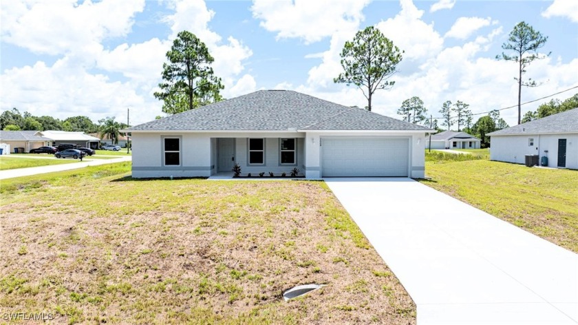 You Will Be Amazed By The Quality Of This Brand New Construction - Beach Home for sale in Lehigh Acres, Florida on Beachhouse.com