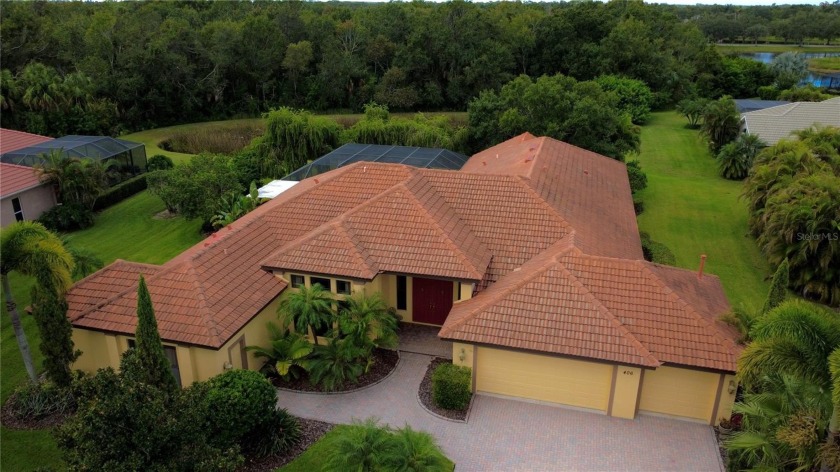 Luxury meets serenity. This Spanish/Mediterranean style home - Beach Home for sale in Bradenton, Florida on Beachhouse.com