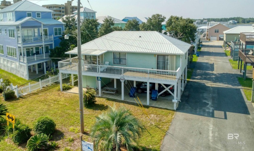 Discover your charming beach retreat nestled in the serene - Beach Home for sale in Gulf Shores, Alabama on Beachhouse.com