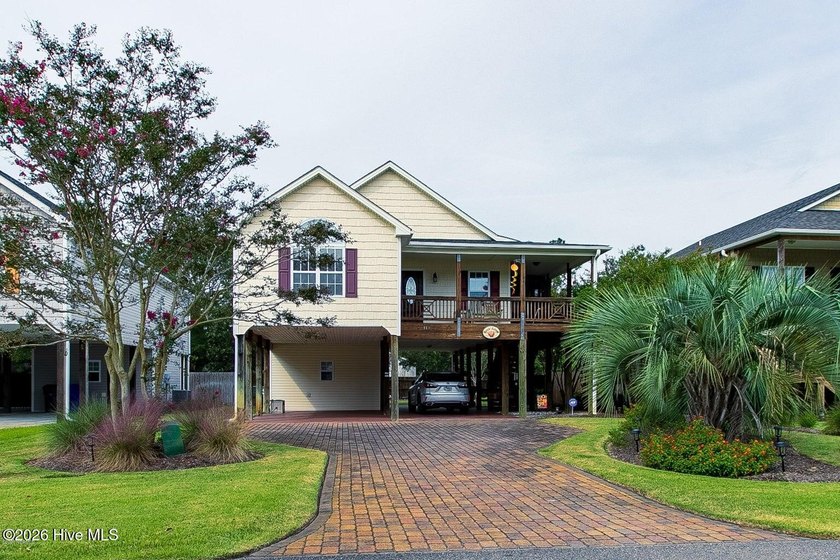 Life feels like a seaside dream in this beautifully maintained - Beach Home for sale in Oak Island, North Carolina on Beachhouse.com