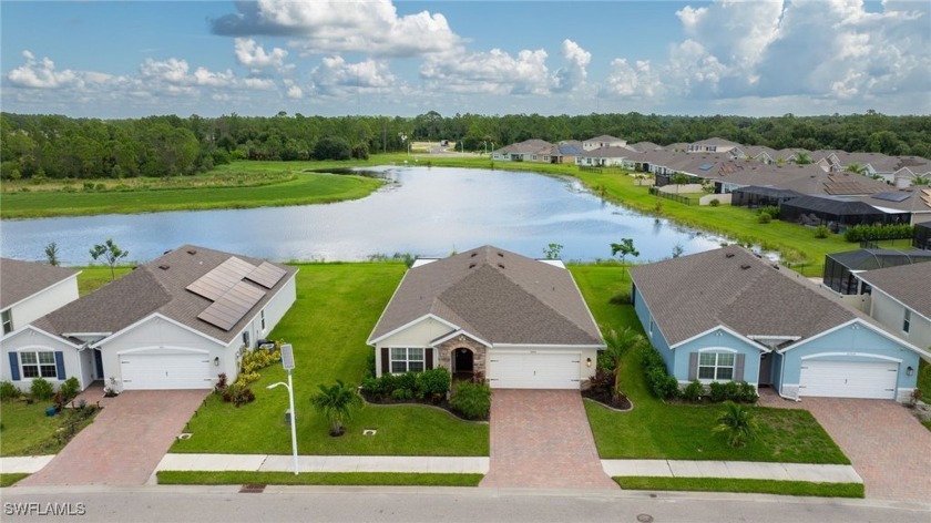 Welcome to this stunning 3-bedroom, 2-bath home with a 2-car - Beach Home for sale in North Fort Myers, Florida on Beachhouse.com