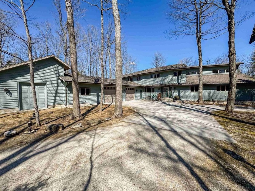 Enjoy 160' of stunning Lake Michigan frontage in this - Beach Home for sale in Sturgeon Bay, Wisconsin on Beachhouse.com