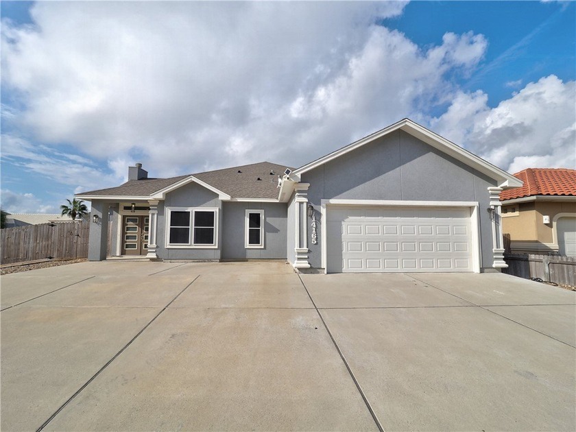 Your Island Oasis awaits you with this exceptional property that - Beach Home for sale in Corpus Christi, Texas on Beachhouse.com