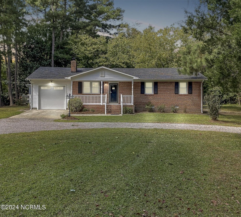 Welcome home to Jessup Street! This one-story brick ranch is - Beach Home for sale in Elizabeth City, North Carolina on Beachhouse.com