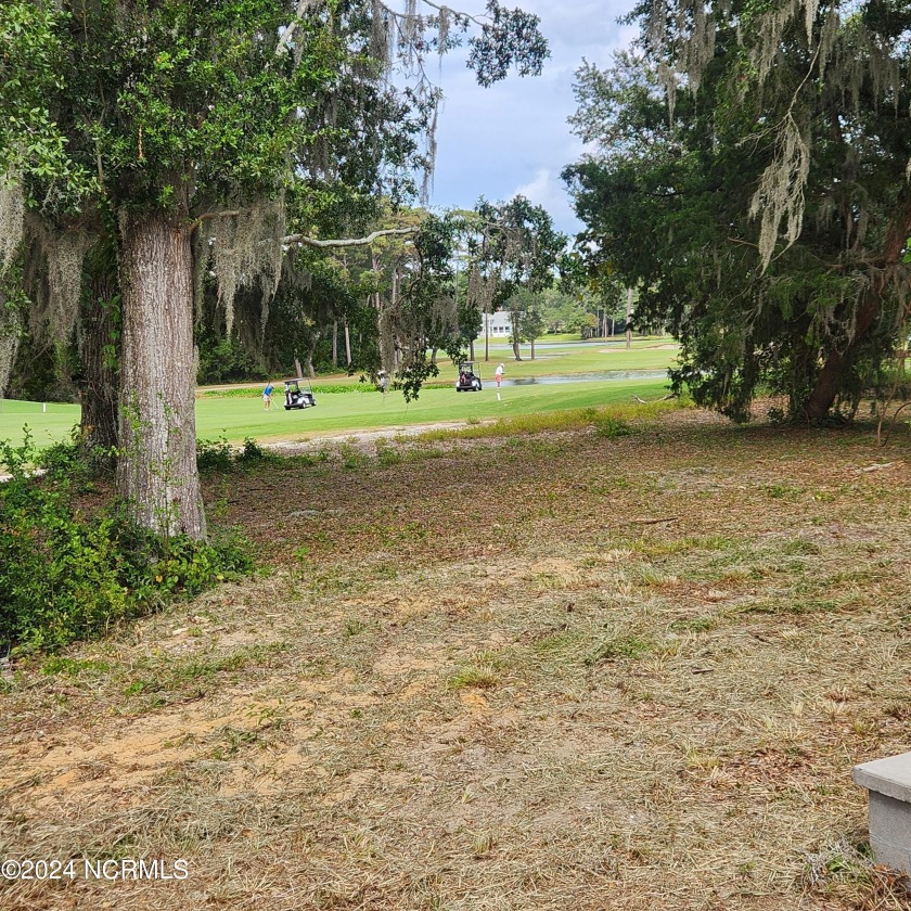 New construction home overlooking Oyster Harbor Golf Course with - Beach Home for sale in Sunset Beach, North Carolina on Beachhouse.com