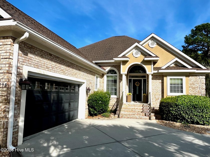 Welcome to this custom-built, one-level brick home located in - Beach Home for sale in Ocean Isle Beach, North Carolina on Beachhouse.com