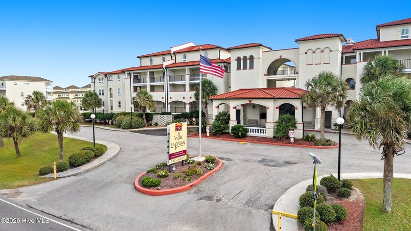Set along the ocean's edge, this beautifully updated two-story - Beach Condo for sale in North Topsail Beach, North Carolina on Beachhouse.com