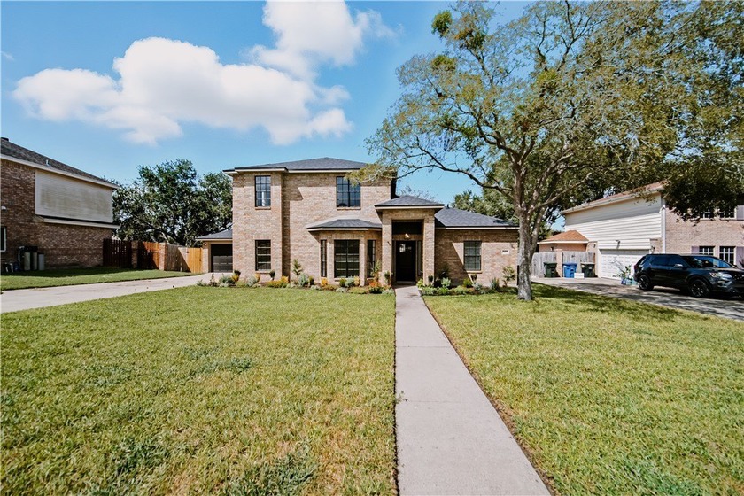 This stunning 5-bedroom, 2.5-bath residence offers 2,330 sq. ft - Beach Home for sale in Corpus Christi, Texas on Beachhouse.com
