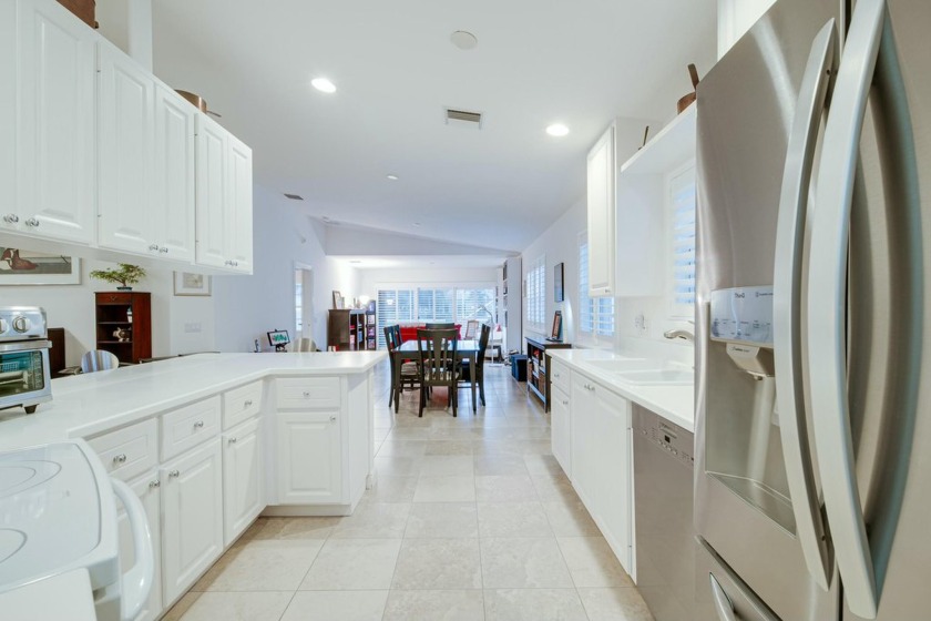 Discover this beautifully maintained Extended Capri model in the - Beach Townhome/Townhouse for sale in Wellington, Florida on Beachhouse.com