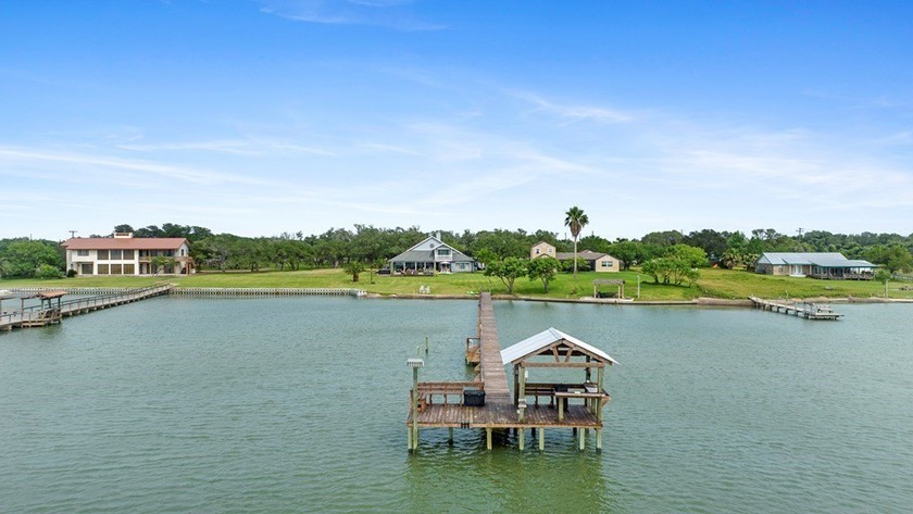 This home is located on Copano Bay in a quiet neighborhood with - Beach Home for sale in Rockport, Texas on Beachhouse.com