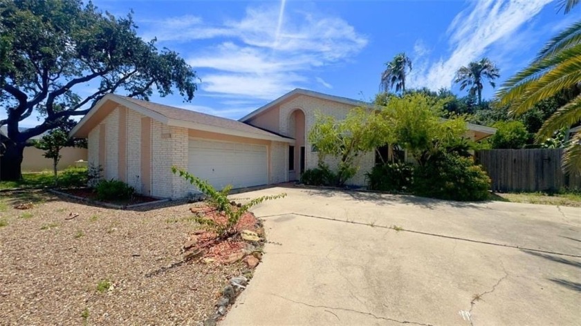 Discover the potential in this 3-bedroom, 2-bath home located - Beach Home for sale in Corpus Christi, Texas on Beachhouse.com