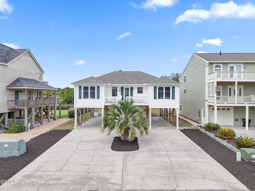 Get away to the barrier island of Holden Beach, where this home - Beach Home for sale in Holden Beach, North Carolina on Beachhouse.com