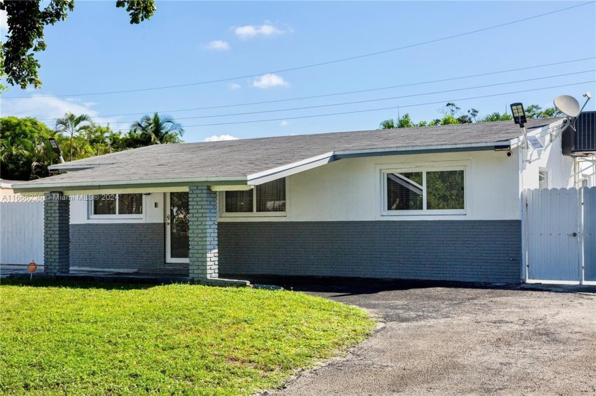 Come see this lovely 3/2 single family pool home. Step inside to - Beach Home for sale in Hollywood, Florida on Beachhouse.com