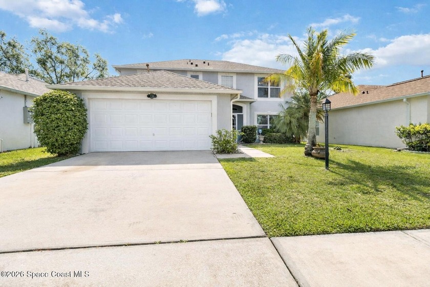 This captivating 2-story residence offers 4 bedrooms (plus flex) - Beach Home for sale in Melbourne, Florida on Beachhouse.com