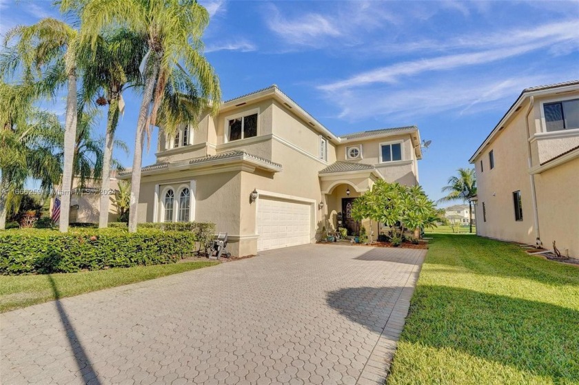 Welcome to your dream home in the highly sought-after Laguna - Beach Home for sale in Pembroke Pines, Florida on Beachhouse.com