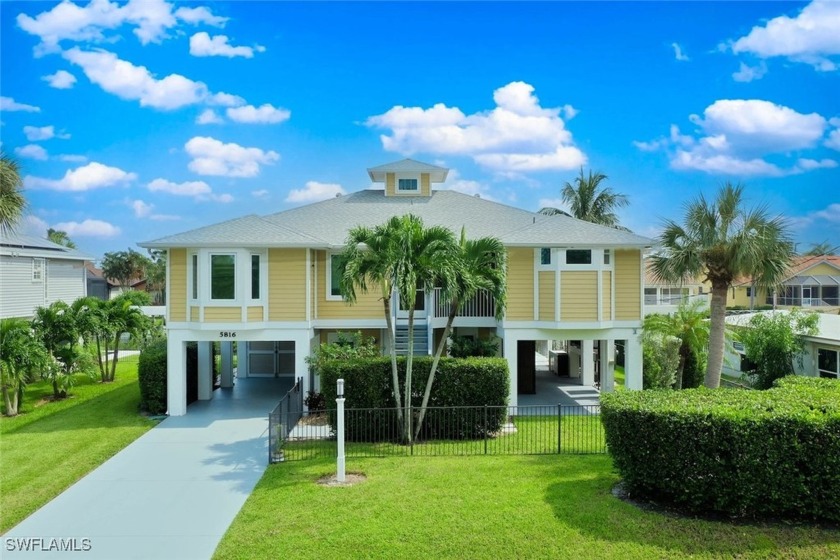 This inviting 3-bedroom, 2.5-bathroom Gulf-access home offers a - Beach Home for sale in Fort Myers, Florida on Beachhouse.com