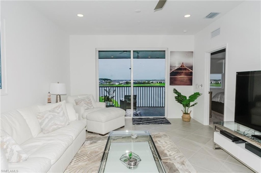 This home has the best top floor water view, together with golf - Beach Home for sale in Ave Maria, Florida on Beachhouse.com