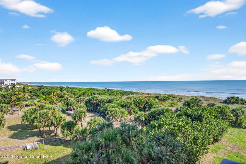 NE Corner Unit with Stunning Wrap-Around Views! Step into this - Beach Condo for sale in Cocoa Beach, Florida on Beachhouse.com