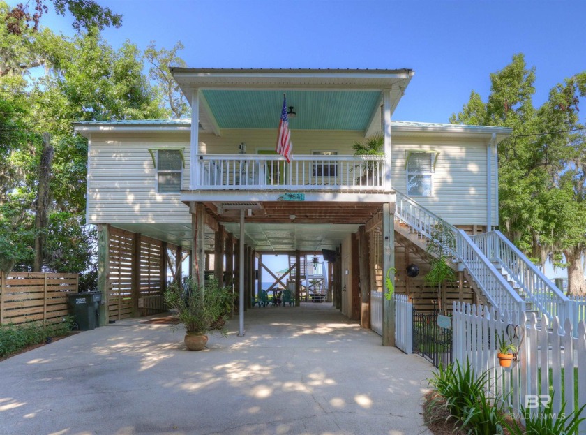 Experience the ultimate in waterfront living with this - Beach Home for sale in Foley, Alabama on Beachhouse.com