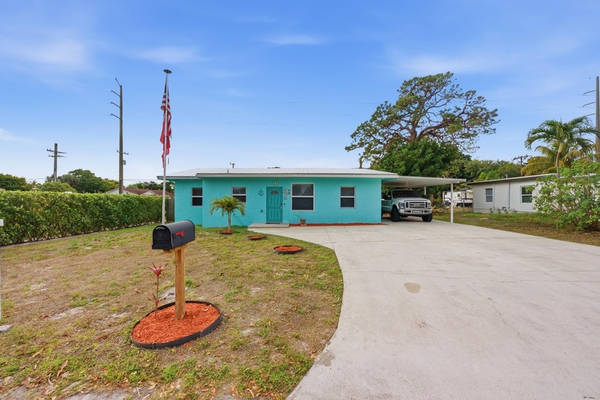 Step into this charming, beautifully updated home in Boynton - Beach Home for sale in Boynton Beach, Florida on Beachhouse.com