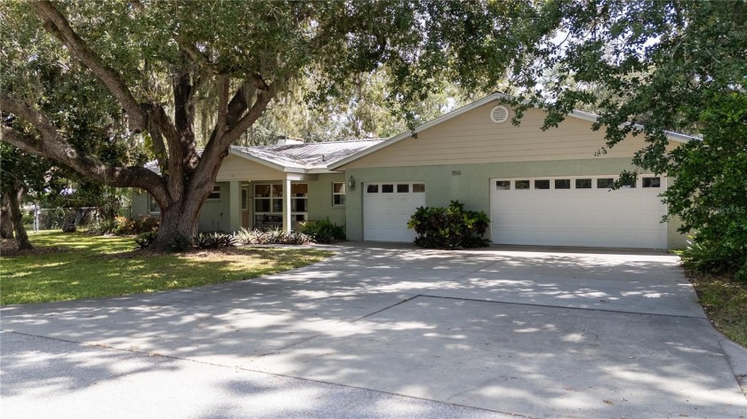 Just five minutes from downtown Sarasota, this unique 1.5-acre - Beach Home for sale in Sarasota, Florida on Beachhouse.com