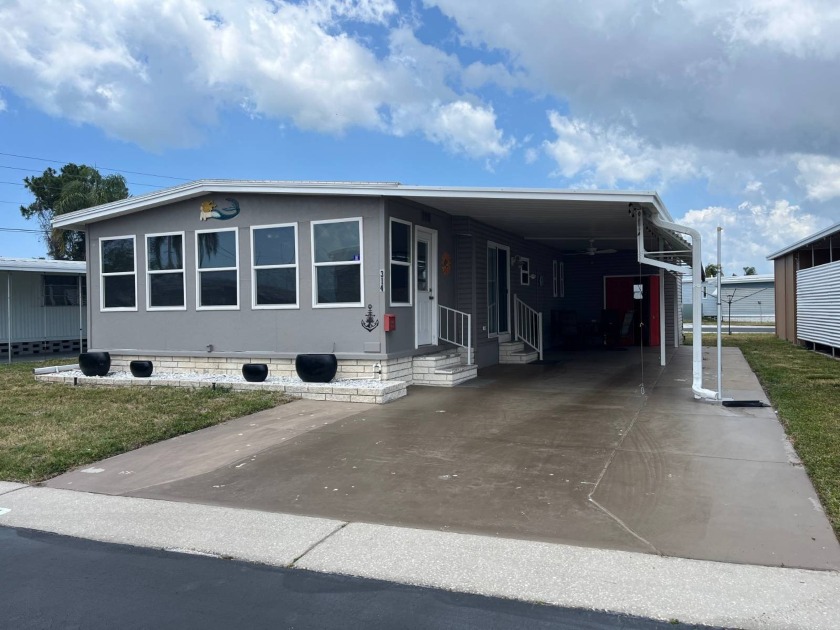 This stylish, fully furnished, completely remodeled 2 Bed/2 Bath - Beach Home for sale in Largo, Florida on Beachhouse.com