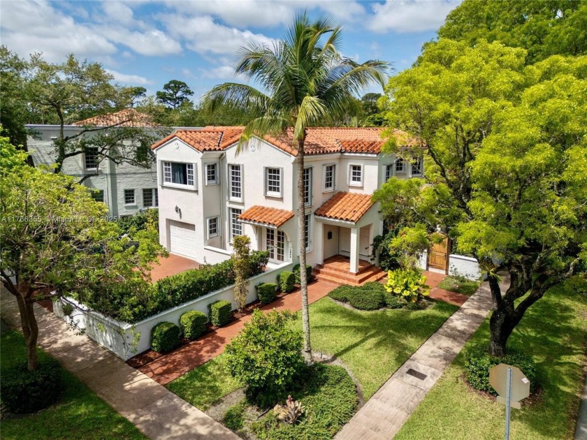 This elegant Spanish home filled with natural light, is situated - Beach Home for sale in Coral Gables, Florida on Beachhouse.com