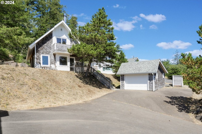 Just steps from Netarts Bay and the Pacific Ocean, this - Beach Home for sale in Tillamook, Oregon on Beachhouse.com