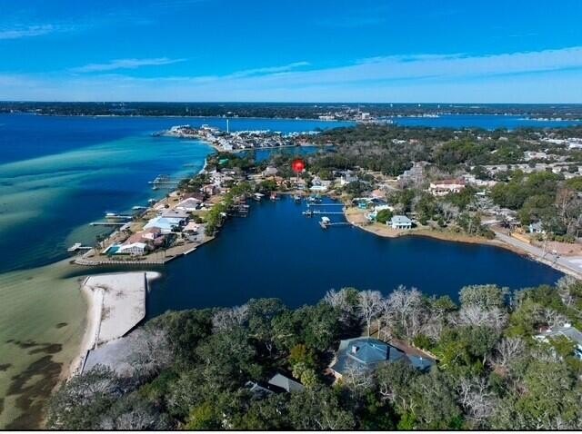 STUNNING WATERFRONT HOME WITH POOL, BOAT SLIPS, AND OUTDOOR - Beach Home for sale in Shalimar, Florida on Beachhouse.com