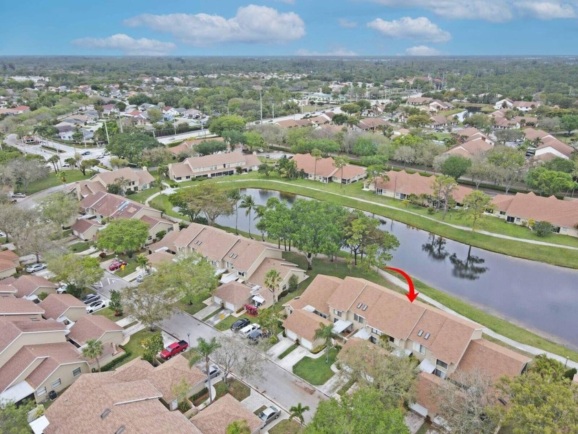 Discover the charm of a two-story townhome nestled along the - Beach Townhome/Townhouse for sale in Greenacres, Florida on Beachhouse.com