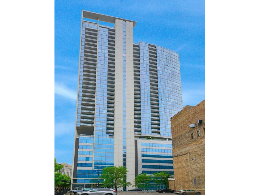 Highly sought-after corner residence at the desirable Silver - Beach Condo for sale in Chicago, Illinois on Beachhouse.com