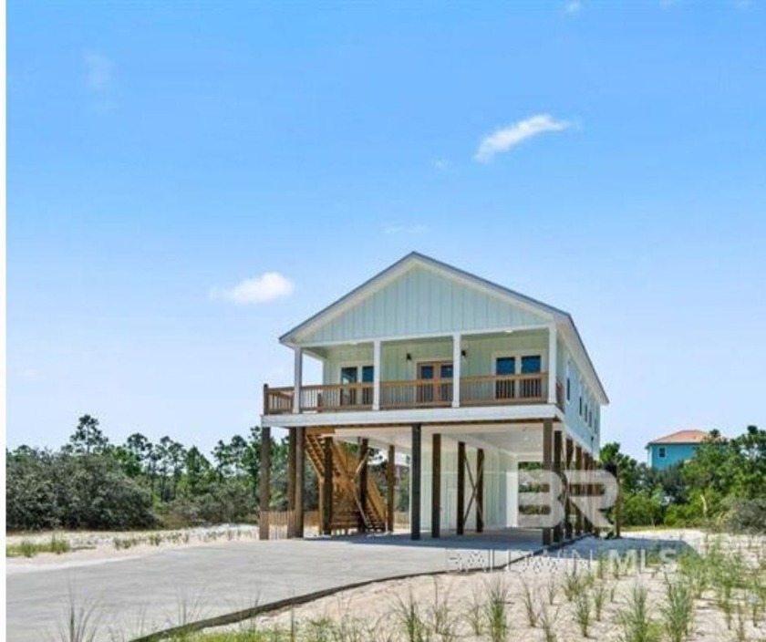 Discover Coastal Elegance! Welcome to your GOLD FORTIFIED dream - Beach Home for sale in Gulf Shores, Alabama on Beachhouse.com