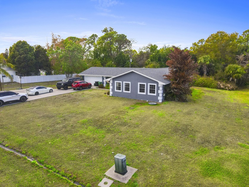 Beautifully maintained home featuring a brand-new 2025 roof for - Beach Home for sale in Port Saint Lucie, Florida on Beachhouse.com