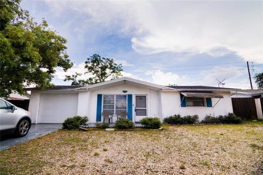 This three bedroom and one bath home is just waiting for you! - Beach Home for sale in Port Richey, Florida on Beachhouse.com