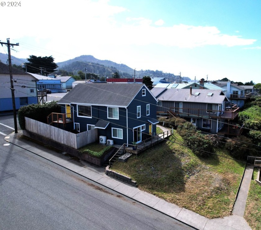 Discover this beautifully updated OCEANVIEW duplex, ideally - Beach Lot for sale in Gold Beach, Oregon on Beachhouse.com