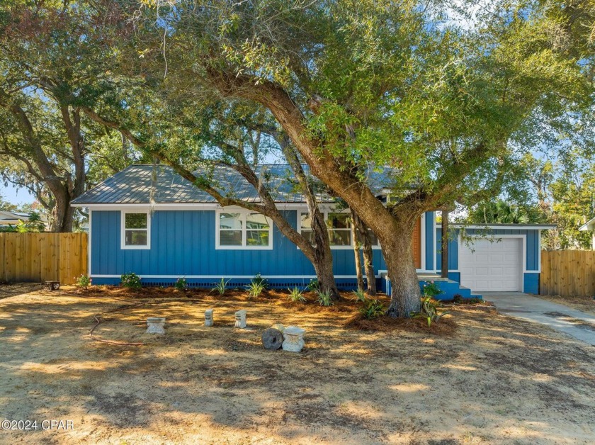 Welcome to 115 Rowe Ave, a stunningly renovated 3-bedroom, 1 - Beach Home for sale in Panama City, Florida on Beachhouse.com