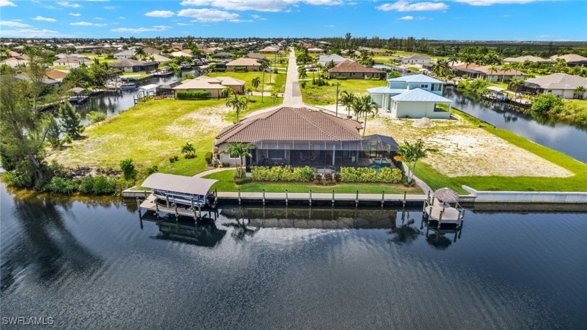 WOW! Intersecting Canal Views and 153 Feet of Waterfront! - Beach Home for sale in Cape Coral, Florida on Beachhouse.com